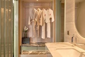 a bathroom with a sink and a mirror at Solaria d'Oriente Hotel in Hanoi +95 photos