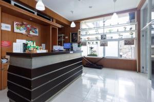 a lobby of a store with a counter at RedDoorz Premium @ Ampera Raya 2 in Jakarta