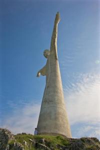 a statue of christ the redeemer on top of a hill at Romantic Hotel & Restaurant Villa Cheta Elite in Maratea