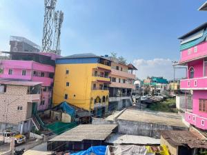 an overhead view of a city with colorful buildings at Instahomestay in Vālpārai