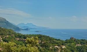 a view of the lake luginia from a hill at Romantic Hotel & Restaurant Villa Cheta Elite in Maratea