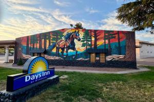 a mural of a horse on the side of a building at Days Inn by Wyndham Payson in Payson