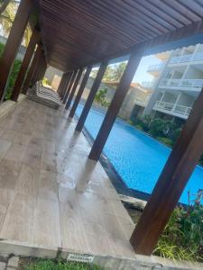 a view of the pool from the patio of a building at Secret Passage in Uswetakeiyawa