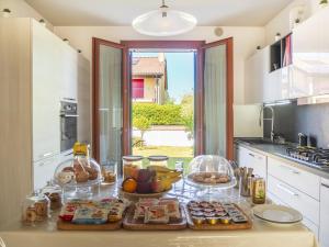a kitchen with a bunch of food on a counter at B&B Ca' Rina in Preganziol