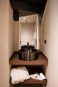 a bathroom with a sink and a mirror at Resort Casa del Monte 1553 in Albenga +38 photos