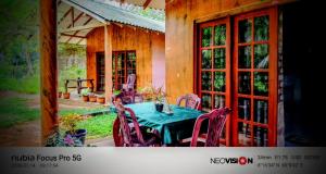 a table and chairs in the back of a house at wilpattu lake nest in Horuwila