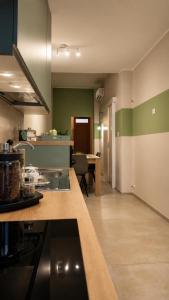 a kitchen with a sink and a counter top at L altra Volta in San Pietro Vernotico