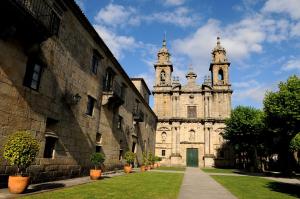 an old building with two towers and a church at A Casa da Tía Babel in O Casal Pontevedra