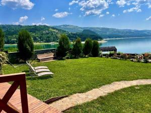 a park with a view of a lake at Cabana Panoramic Bicaz in Hangul