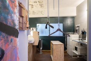 a kitchen with a sink and a counter top at apartment hotel Tasu Toco room 2 in Kichijōji +2 photos