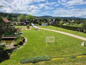 a park with a soccer ball in the grass at Willa Zielona Polana in Czarna Góra +169 photos
