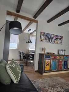a living room with a couch and a table at Excellent house in Ediger-Eller