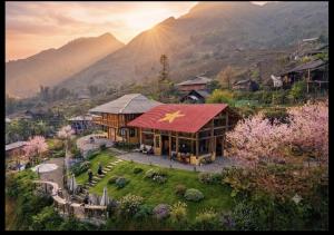 an aerial view of a house with a red roof at Ap Retreat - Ta Van's Heel in Sapa