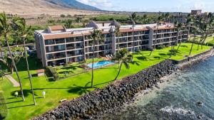 an aerial view of a resort with a pool at Spectacular luxury , modern oceanfront condo Maalaea-Kihei ,Maui in Wailuku