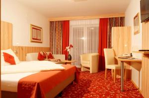 Letto o letti in una camera di All Inclusive Hotel Sonnenhügel
