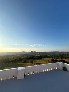 a view from the roof of a house with a view at Respiro di luna in Pescopagano +8 photos