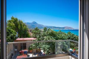 a view of the ocean from a balcony at Elia Suites in Falasarna