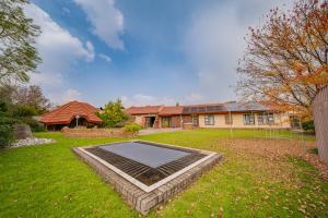 a house with a trampoline in the yard at 3 Italeni in Secunda