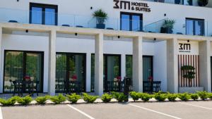 a rendering of the front of a building at 3M Hostel & Suites in Alvaiázere