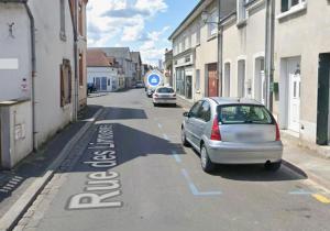a car parked on the side of a street at Les 4 Horizons in Romorantin