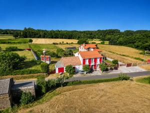 an aerial view of a house in a field at Rivera de Poulo in Ordes