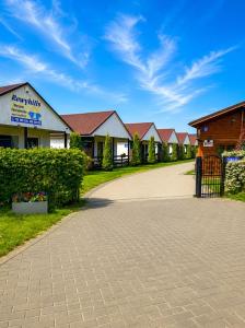 a driveway in front of a row of houses at Rowyhills in Rowy