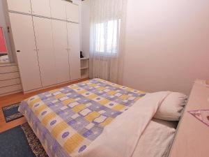 Posteľ alebo postele v izbe v ubytovaní Apartments Pula 926