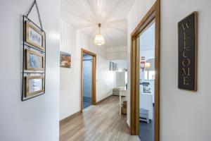 a hallway with white walls and a white ceiling at T1 Morderno - Alvor in Alvor +12 photos
