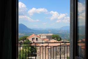 a view of a city from a window at Panorama Rooms in Gesualdo