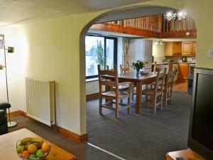 a kitchen and dining room with a table and chairs at Fennel in Kelly