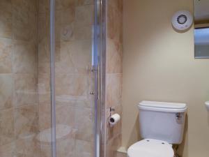 a bathroom with a shower with a toilet at Fennel in Kelly +15 photos