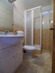 Kúpeľňa v ubytovaní Apartments Biserka
