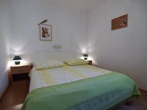 Posteľ alebo postele v izbe v ubytovaní Apartments Biserka