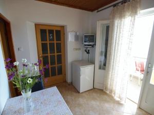 Kuchyňa alebo kuchynka v ubytovaní Apartments Biserka
