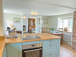 a kitchen with a sink and a counter top at The Dairy - Uk50427 in Malton +17 photos