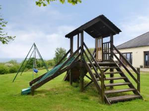 a playground with a slide and a slideintend at Great Meadow in Kelly