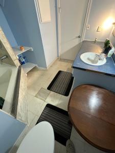 a bathroom with a sink and a toilet at Highway 17 Space Share accommodation in Thessalon +26 photos