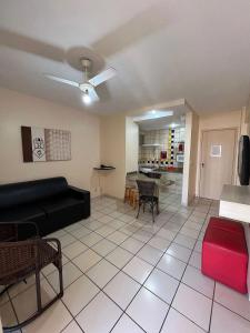 a living room with a couch and a table at CRCN - Eldorado Thermas Park in Caldas Novas