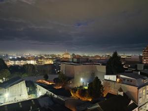 a view of a city at night at Dpto vista hermosa in Osorno