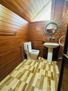 a bathroom with a toilet and a sink at Villa I Did in Beruwala +72 photos