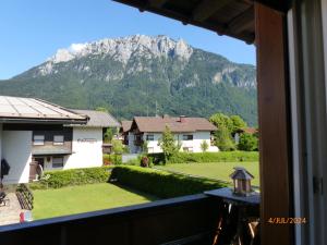 a view of a mountain from the balcony of a house at Appartement Naunspitzblick in Ebbs