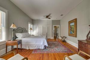 a bedroom with a bed and a ceiling fan at 2-Unit Bundle in Eustis: Walk to Ferran Park! in Eustis
