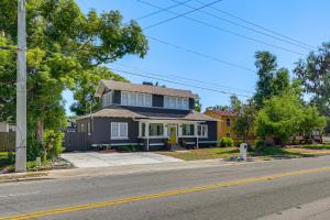a house on the corner of a street with at 2-Unit Bundle in Eustis: Walk to Ferran Park! in Eustis