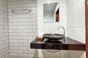 a bathroom with a sink and a mirror at Sabaidee Chiangmai Hotel in Chiang Mai +91 photos