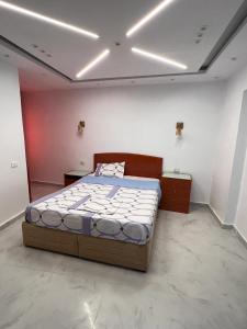 a bedroom with a large bed in a room at Porto sokhna pyramids in Ain Sokhna