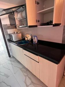 a kitchen with a sink and a counter top at Porto sokhna pyramids in Ain Sokhna