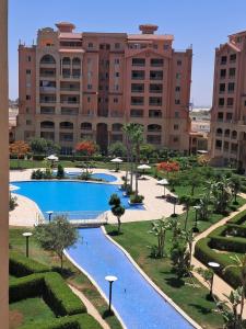 a view of a resort with a large building at Marina Valley El Alamein in El Alamein