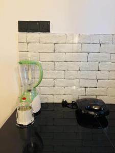 a blender sitting on top of a table at Villa Calista Weligama in Weligama