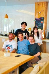 a group of people are posing for a picture at Hotel Imagine Kyoto in Kyoto