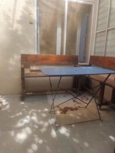 a ping pong table in front of a bench at Theana in Cazilhac +9 photos